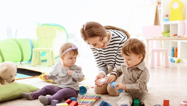 Educator playing with child