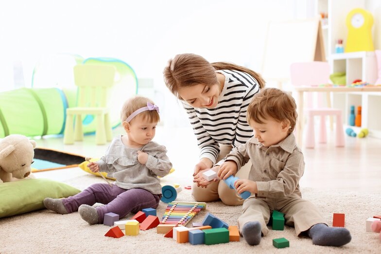 Educator playing with child