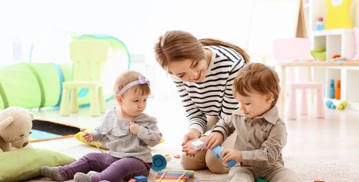 Educator playing with child