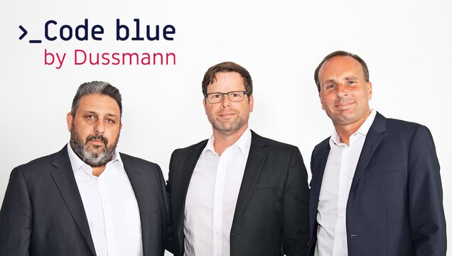 Group photo with founder of Code Blue Ltd., Christian Milde, Managing Director Code Blue GmbH and Wolf-Dieter Adlhoch, CEO of Dussmann Group